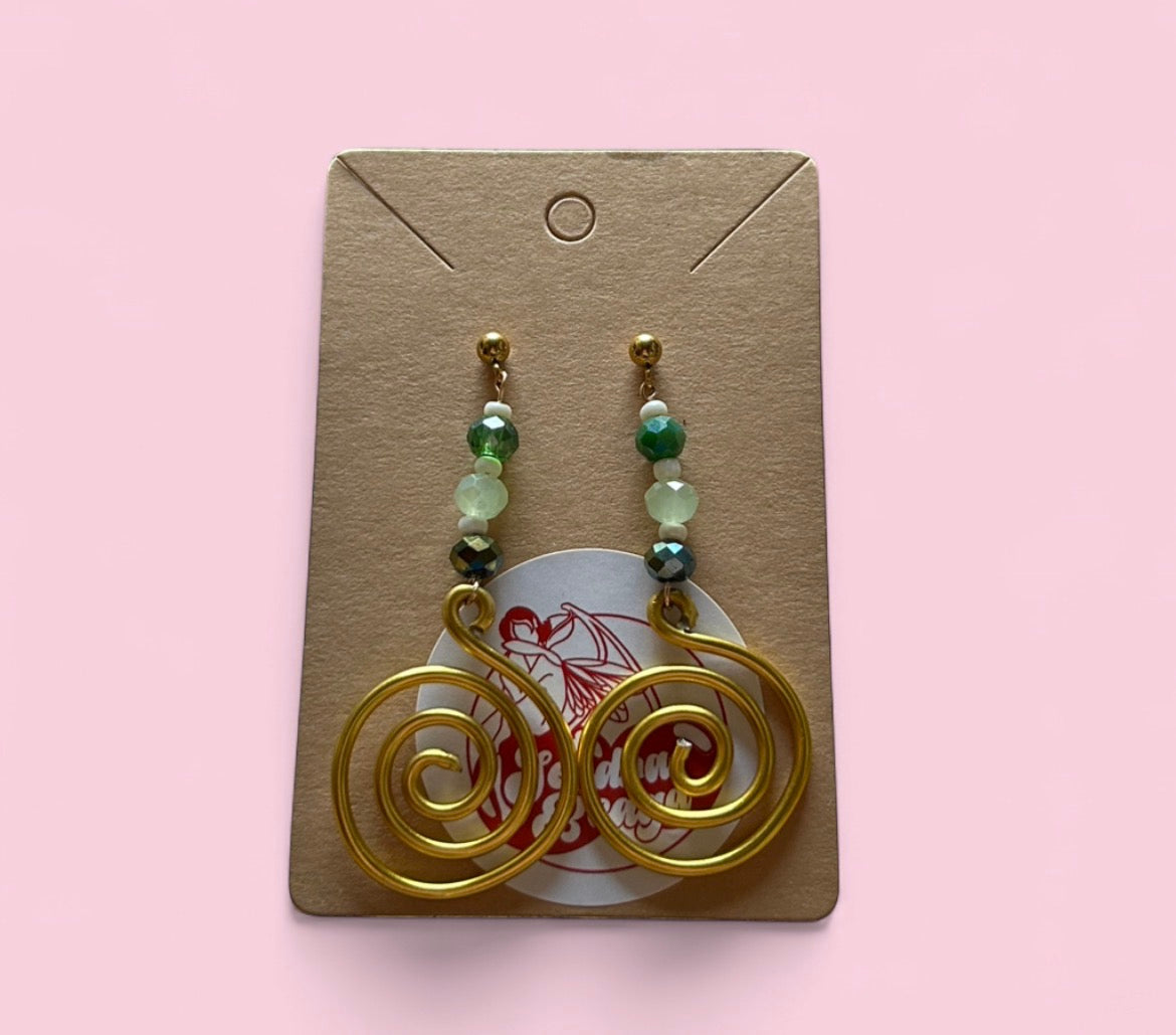 bíseanna óir le cuiríní glass