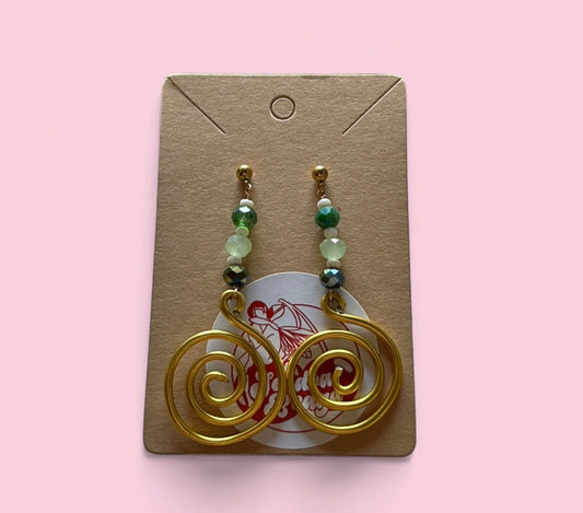 bíseanna óir le cuiríní glass